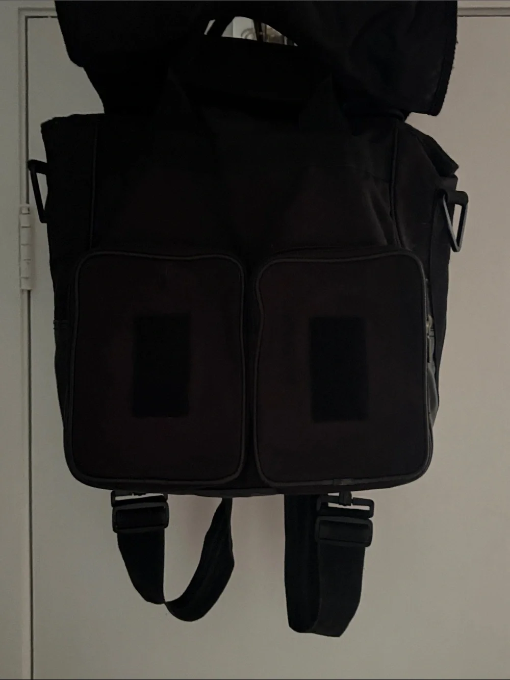 Diesel Vintage Black Canvas Backpack with Red Logo Accent.